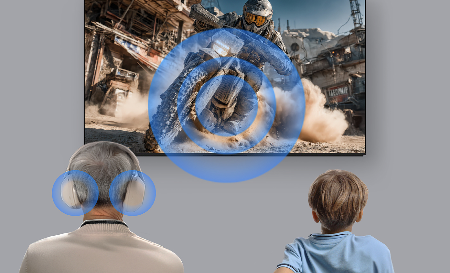 An older adult wearing headphones and a child sitting beside them watch an action scene on a TV screen. Blue sound waves radiate from the screen toward the listener, illustrating shared or simultaneous audio playback so both viewers experience the same sound from the content.